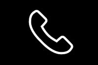 a white telephone icon on a black background